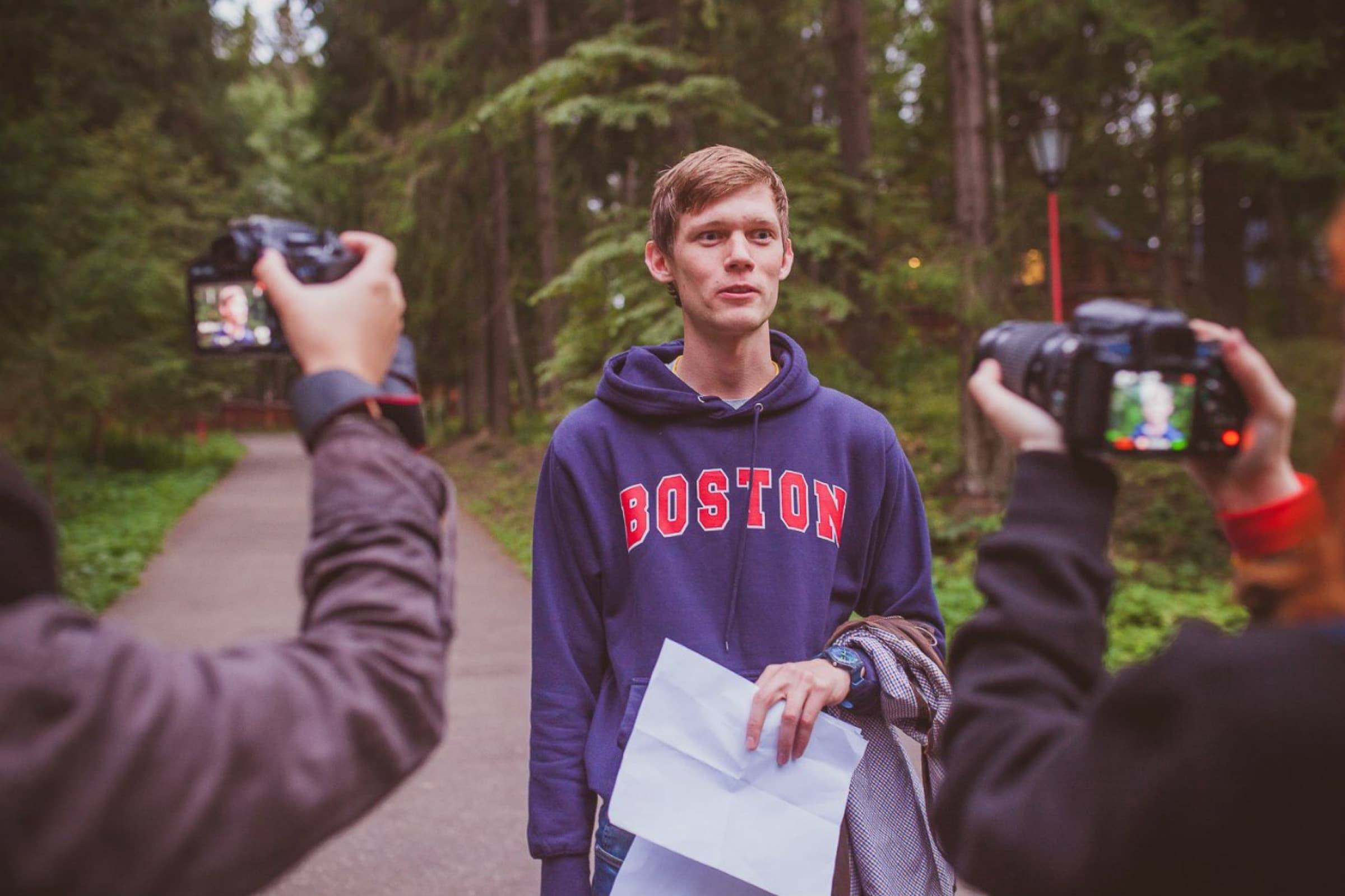 Alex Lindholm during an outdoor media interview
