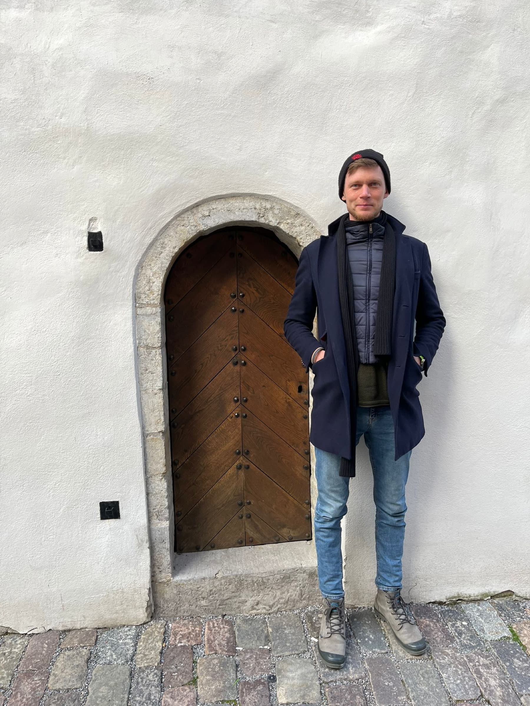 Alex Lindholm in a European city setting